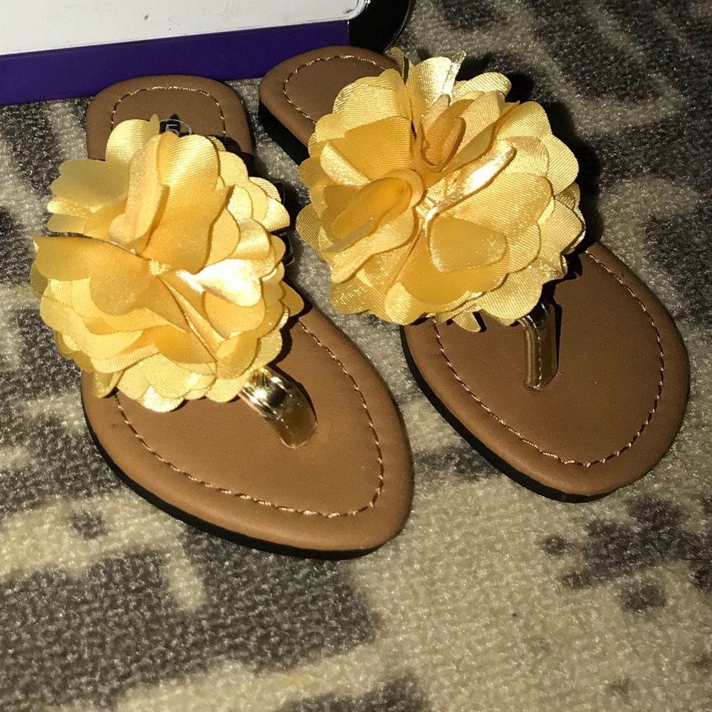 Gold Izzy slip in flip flops
